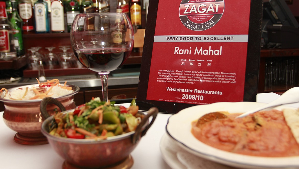 A table set with wine at Rani Mahal